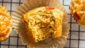 Veggie-loaded pizza muffins baked and ready to serve.