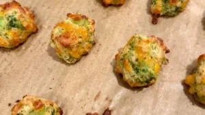 Baked broccoli cheddar tots served on a plate, perfect for a healthy snack