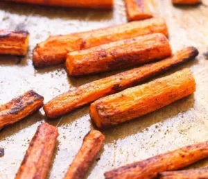 Plate of cinnamon carrot fries for babies, a tasty and healthy snack option.