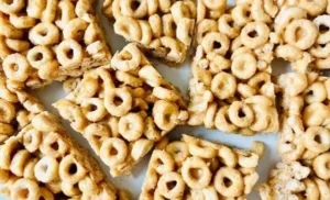 Easy no-bake Cheerio and peanut butter bars on a plate