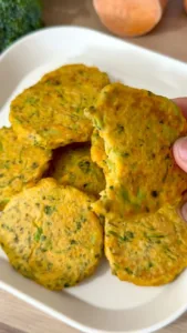 Delicious sweet potato and broccoli fritters served on a plate, perfect for kids and families
