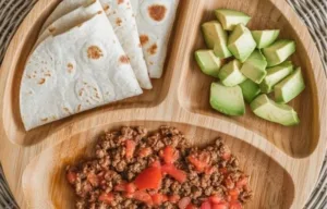 Deconstructed tacos and cheesy rice for toddler dinners