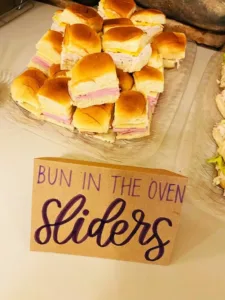 Delicious and colorful girl baby shower food platter with treats and snacks
