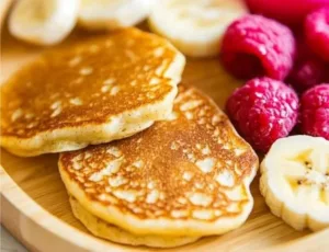 Plate of super simple banana pancakes for baby breakfast