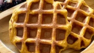 Plate of homemade sweet potato waffles with toppings