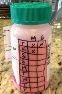 A parent using creative parenting hacks to make daily life easier with kids.