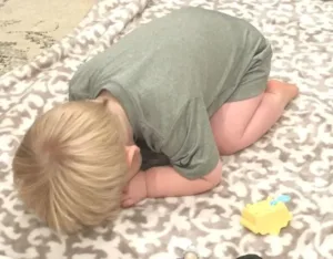 Parent teaching toddler discipline and creating a behavior correction plan
