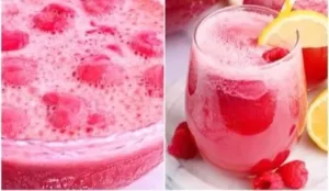 Colorful Baby Shower Punch in a large bowl garnished with fruit slices