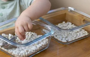 Toddlers engaged in concentration-building activities for better focus.