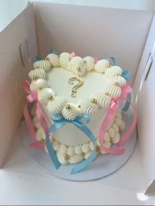 Delightful gender reveal cakes for celebrating baby boy or girl announcements.