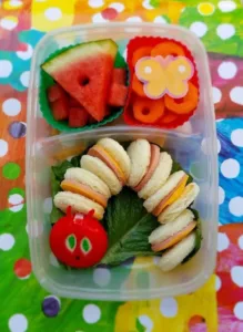 Colorful kids' lunch ideas featuring sandwiches, fruits, and veggies for healthy meals.