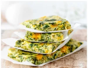 Spinach Zucchini Frittata Fingers garnished and served on a plate