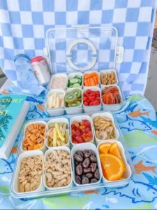 Colorful summer snack box for toddlers filled with healthy treats.