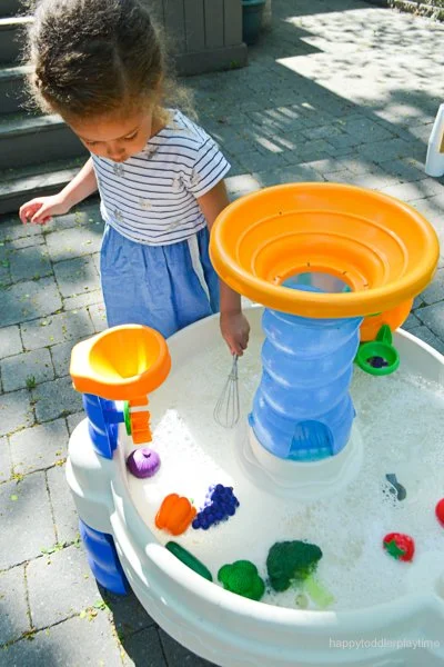 Creative water table ideas for toddlers and busy moms during summer playtime.