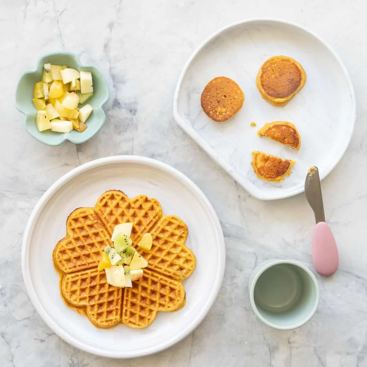 Delicious cozy pumpkin pancakes topped with syrup and spices for breakfast