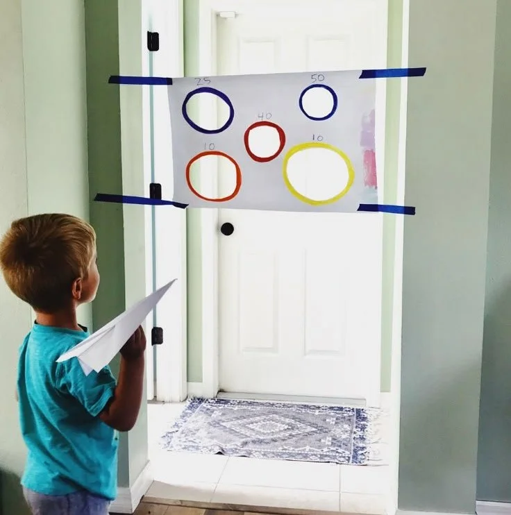 Indoor rainy day activities for kids and moms enjoying fun playtime together.
