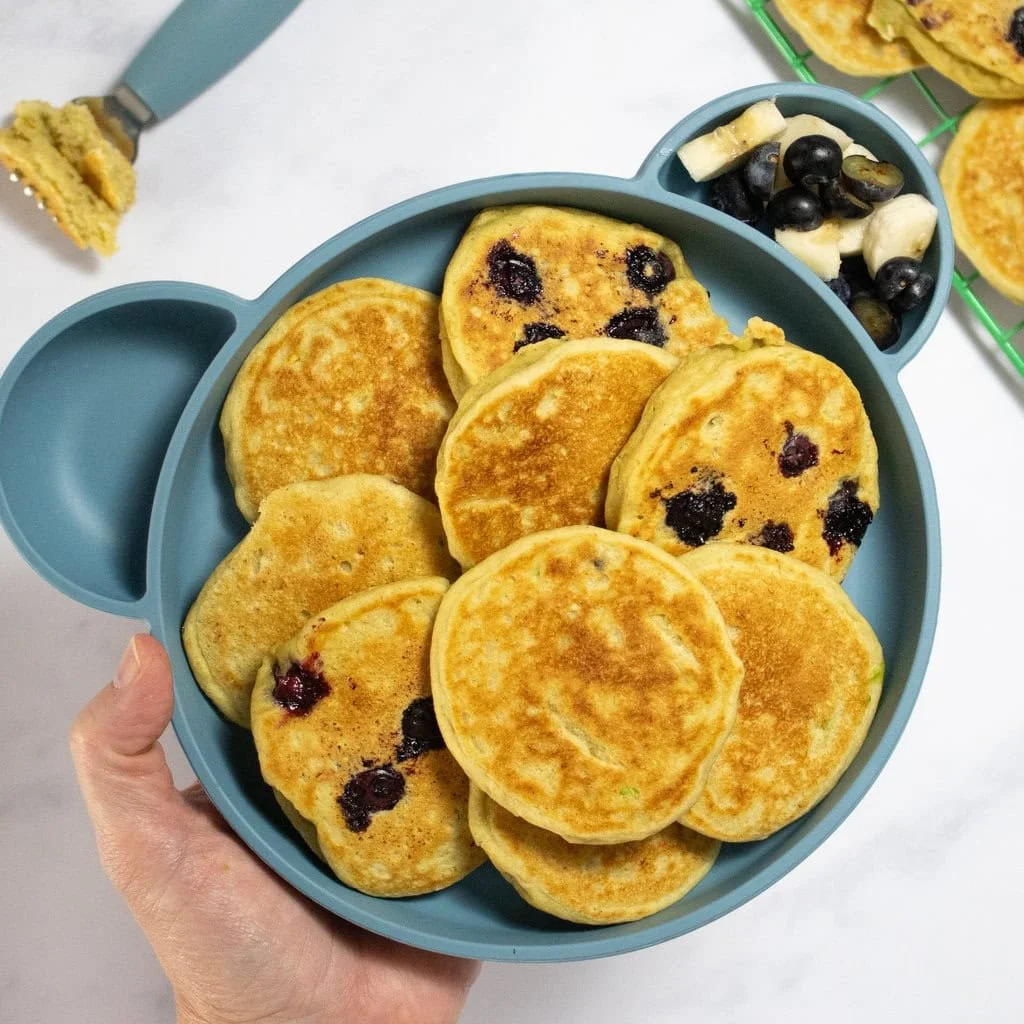 Fluffy avocado pancakes served on a plate, perfect for kids and toddlers.