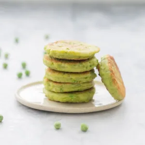 Delicious homemade pea fritters served on a plate.