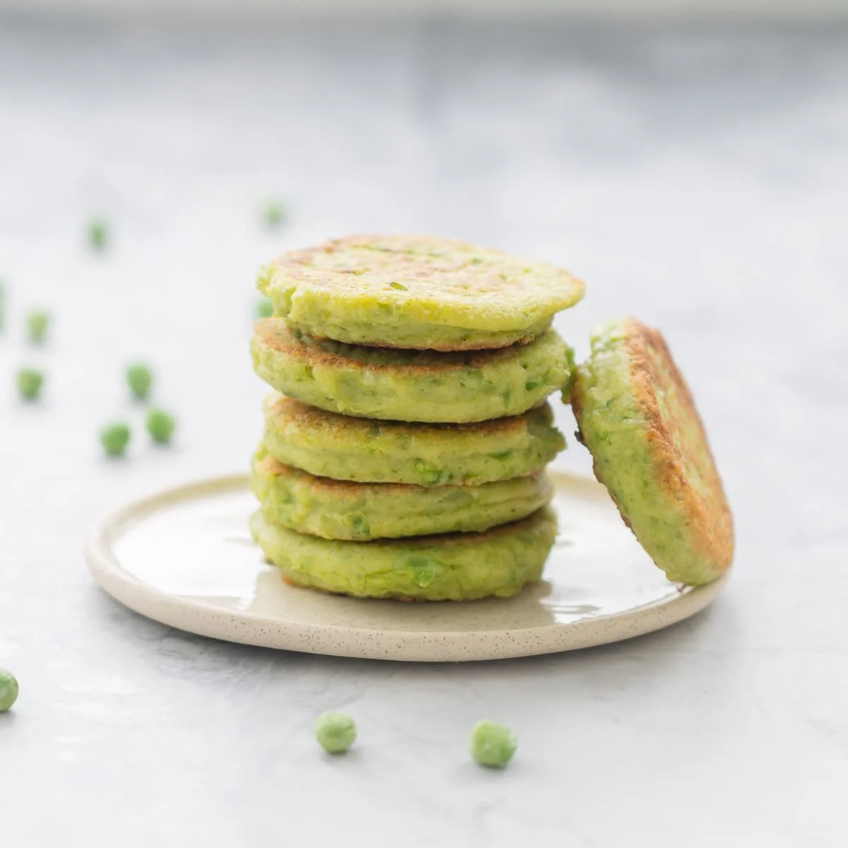 Delicious homemade pea fritters served on a plate.
