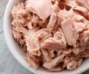 Toddler enjoying a meat meal, tips for picky eaters