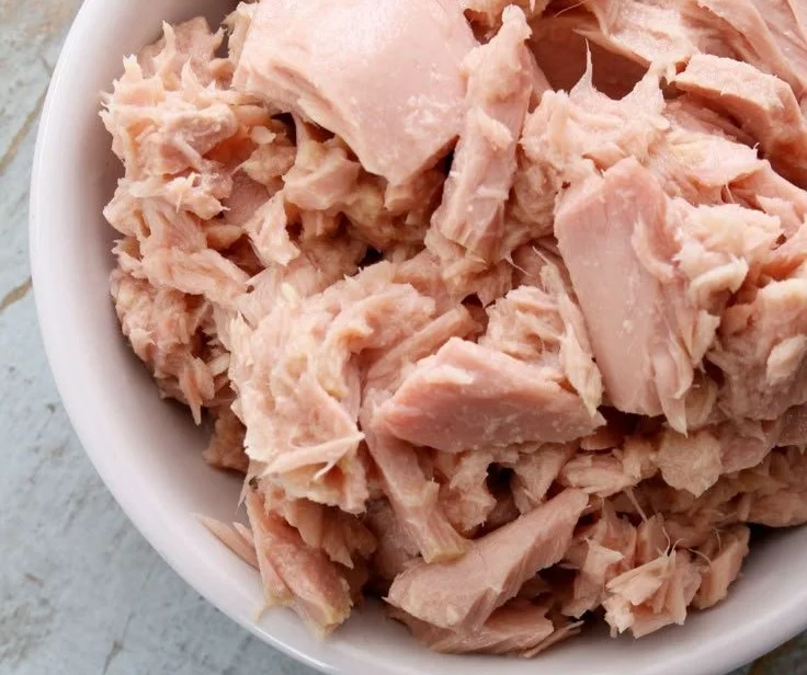 Toddler enjoying a meat meal, tips for picky eaters