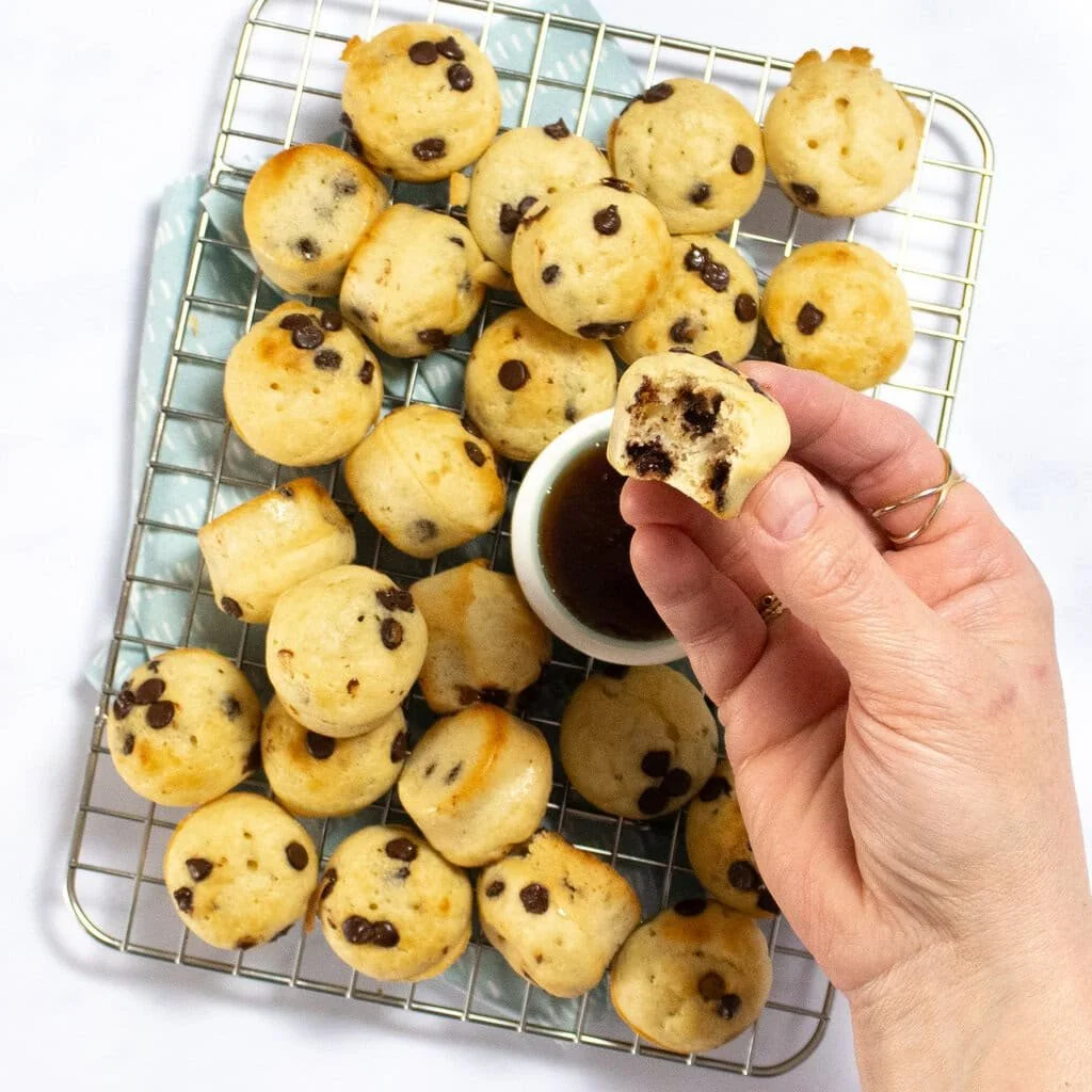 Delicious mini pancake bites served with yogurt for a quick breakfast.