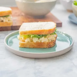 Delicious egg salad sandwich on a plate, perfect for busy moms.
