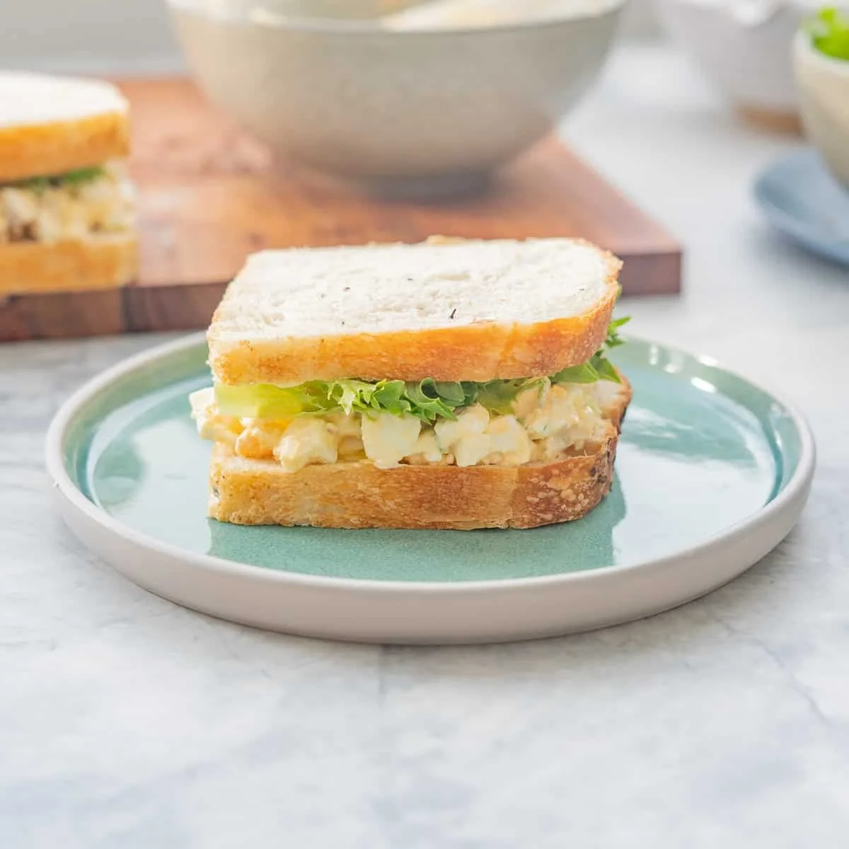 Delicious egg salad sandwich on a plate, perfect for busy moms.