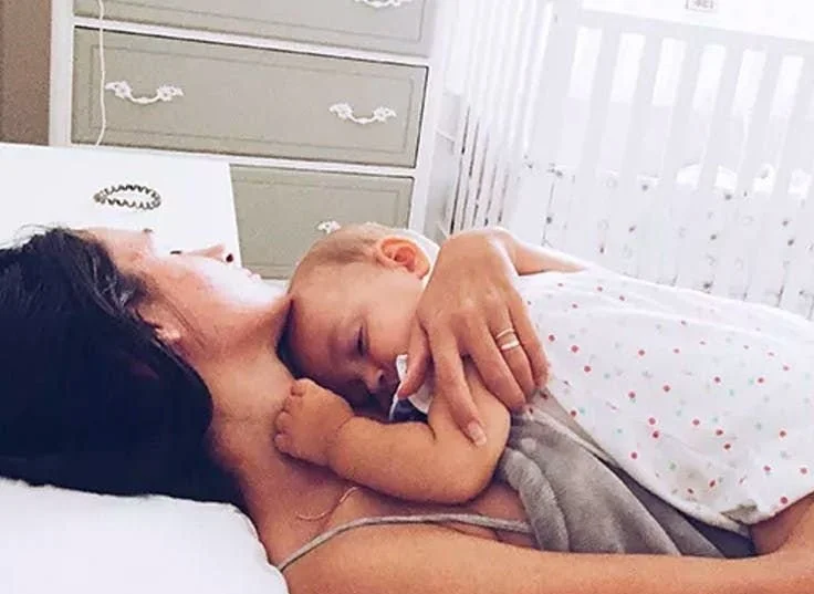 New mother enjoying quality time with her baby during maternity leave.