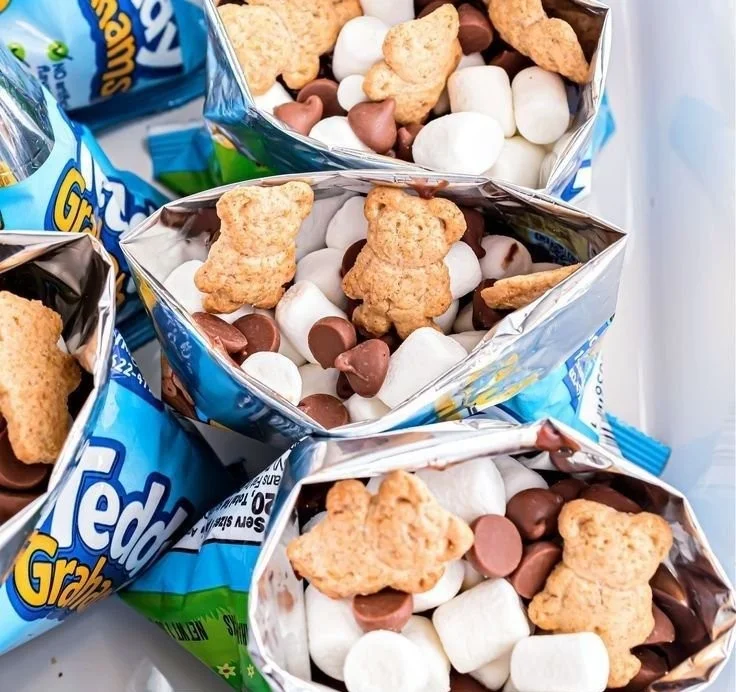 Kids enjoying walking s'mores during a fun camping night